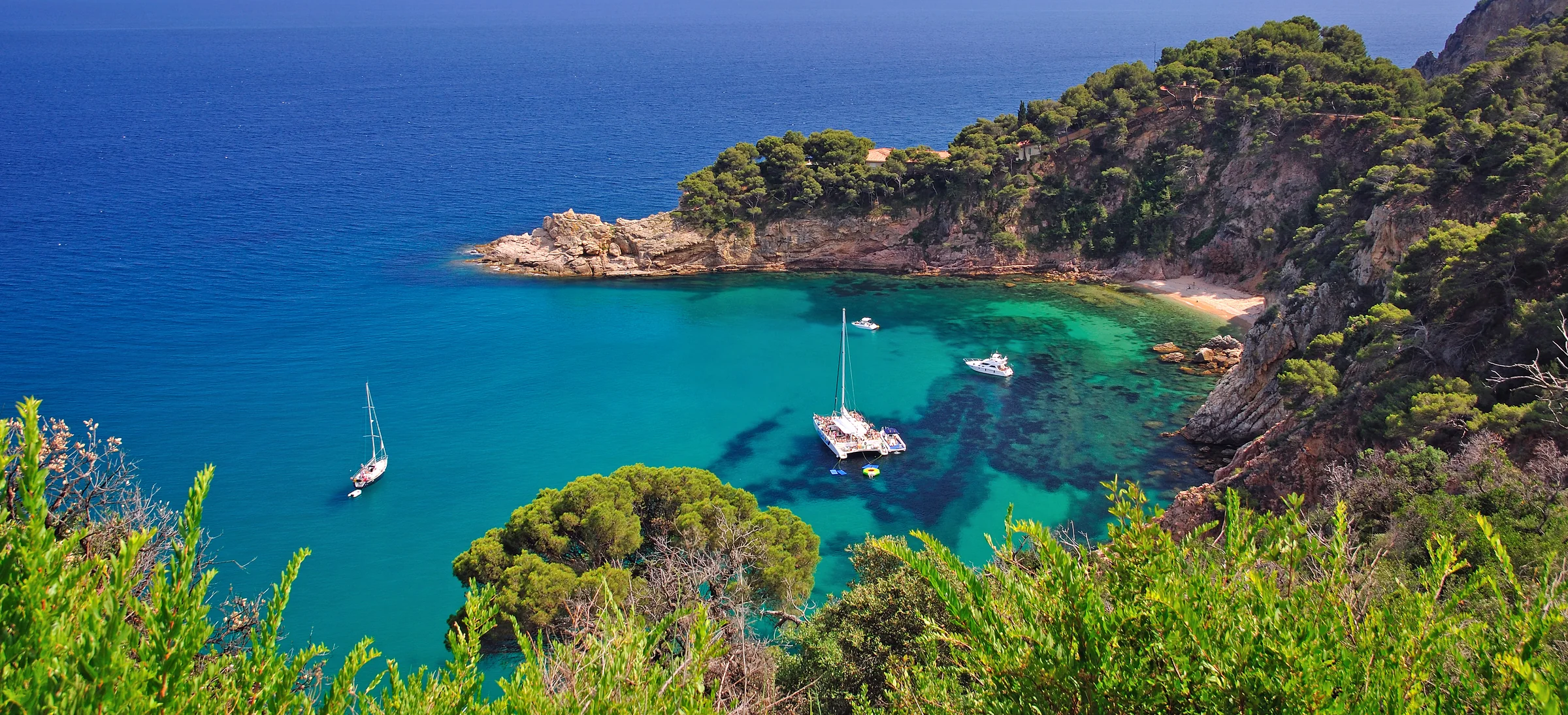 Turquoise cove near Tossa de Mar on the Costa Brava