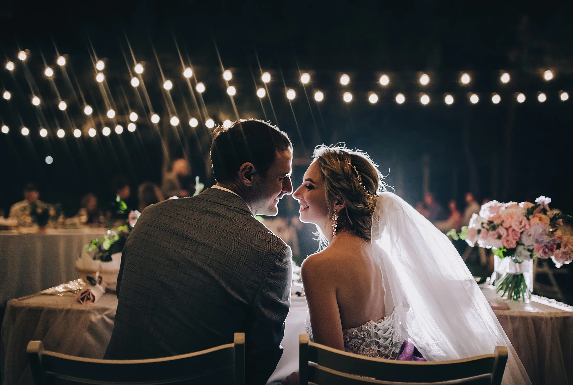 Newly married couple celebrating at an evening wedding in Spain